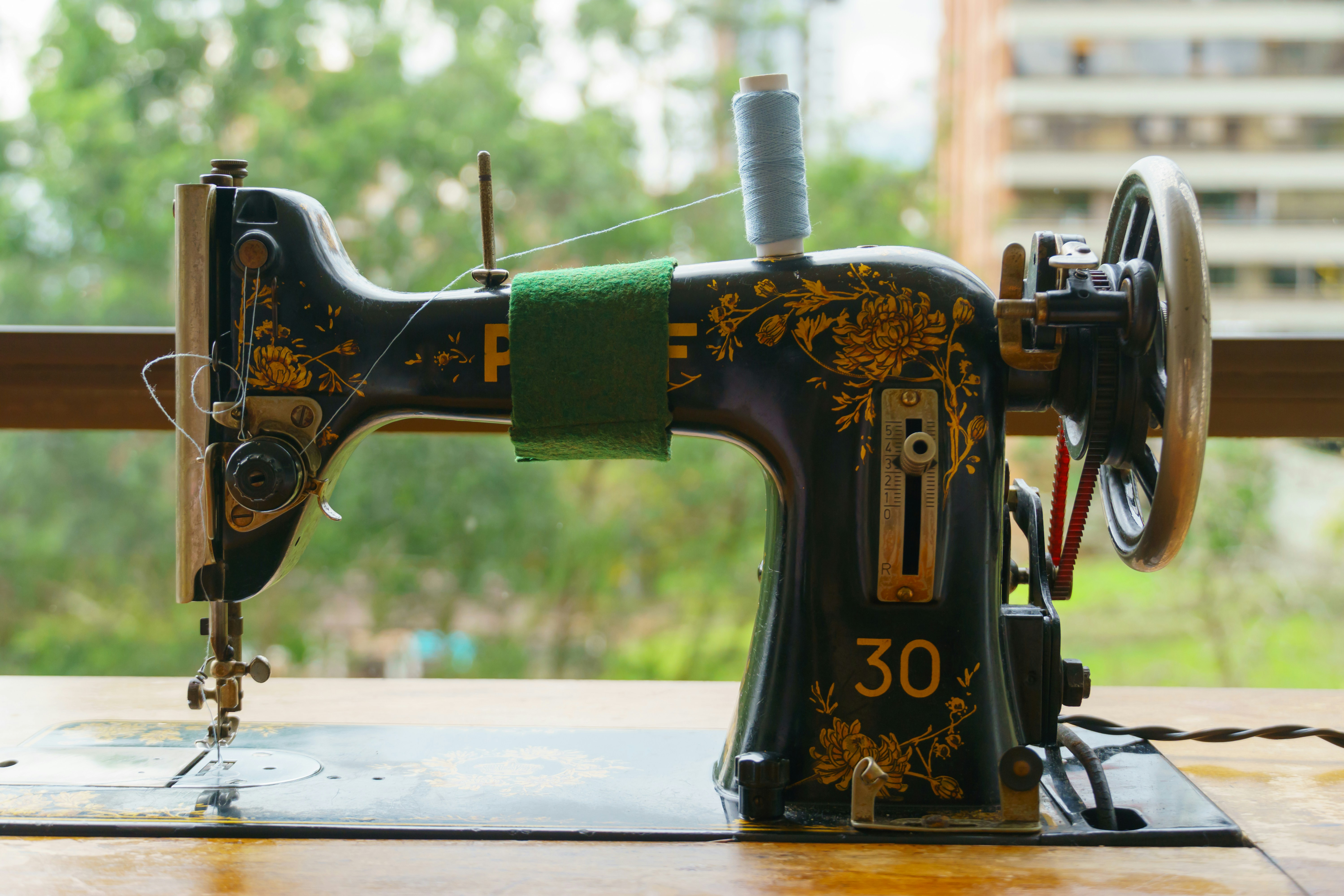 Master tailor crafting a bespoke garment